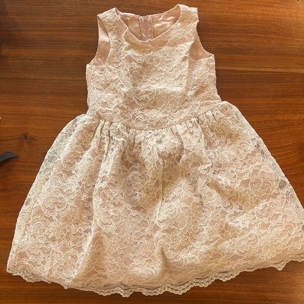Girls cream lace dress - with taffeta underlay. Perfect for a special occasion.